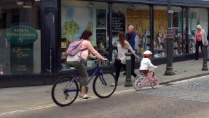 Family cycling in Horsham town centre