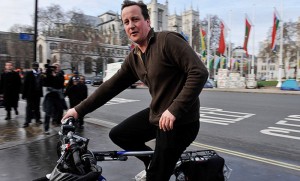 David Cameron arriving at Westminister on his bike (The Sunday Times)