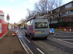Being squeezed by the traffic island